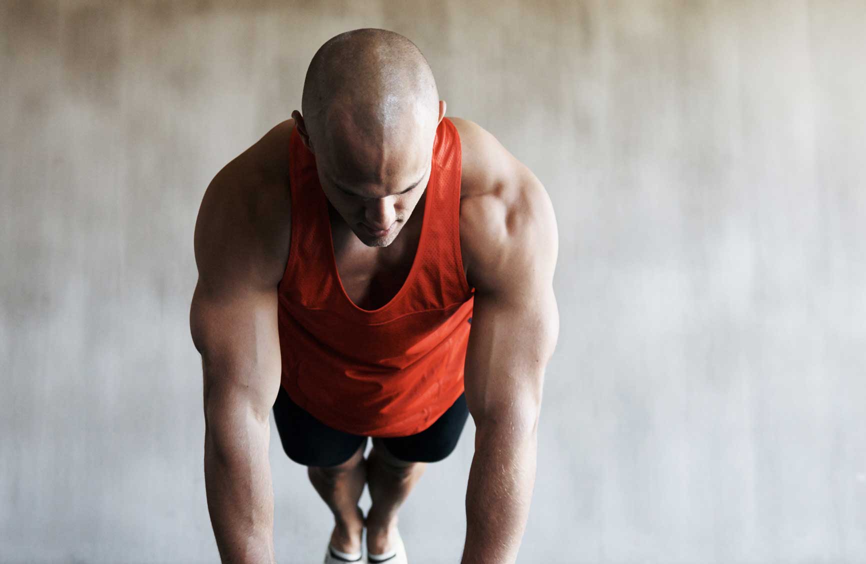 Shot of a handsome young man working out