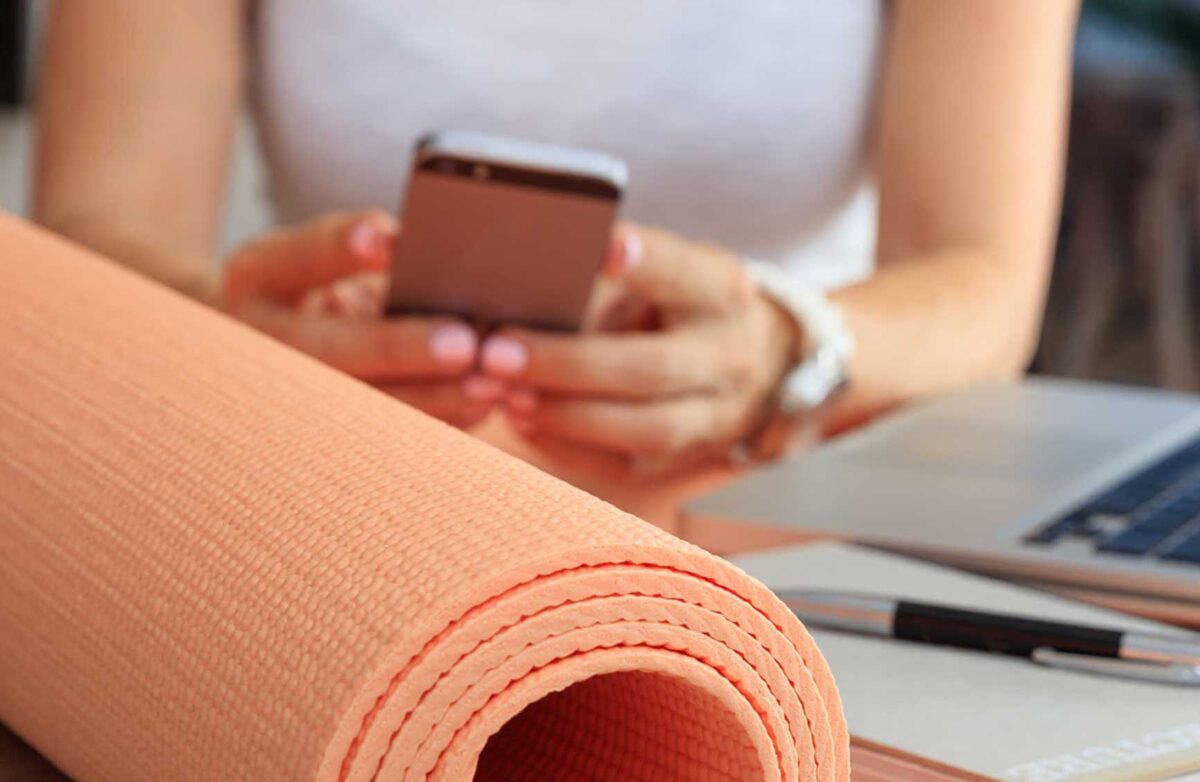 Relax at work concept. Yoga mat in an office desk