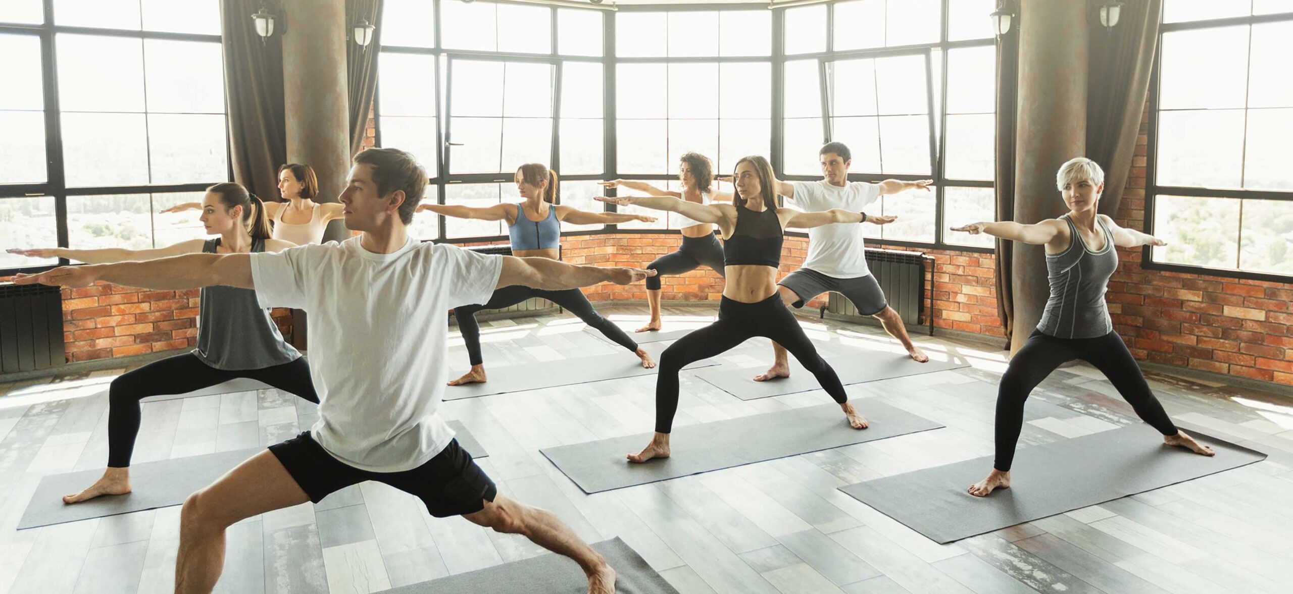 a group of people at a yoga studio
